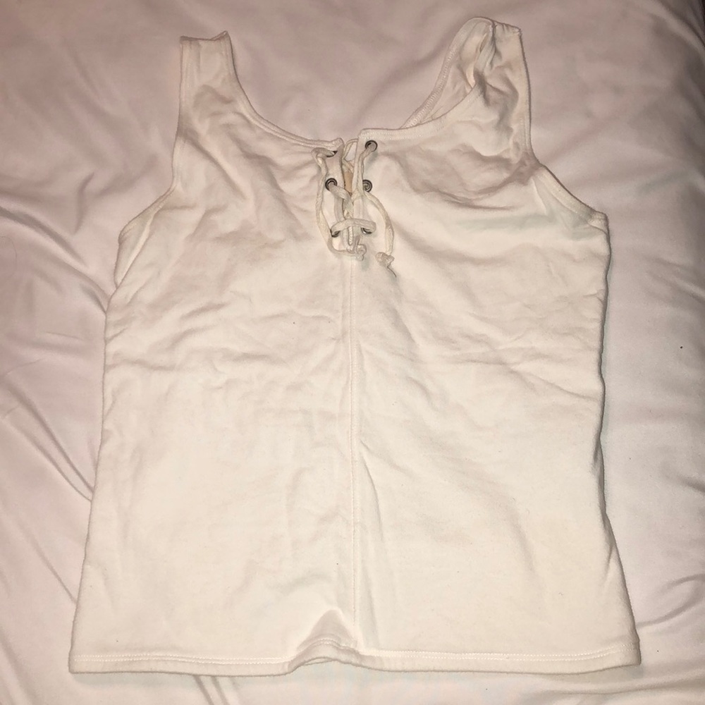 I am selling a white tank top.